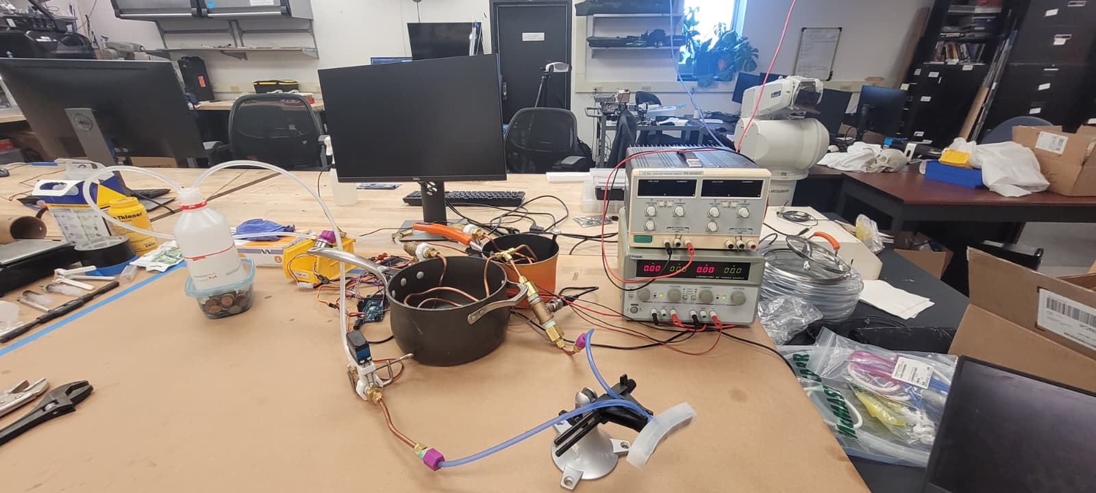 Early lab test setup for the surgical robotic gripper